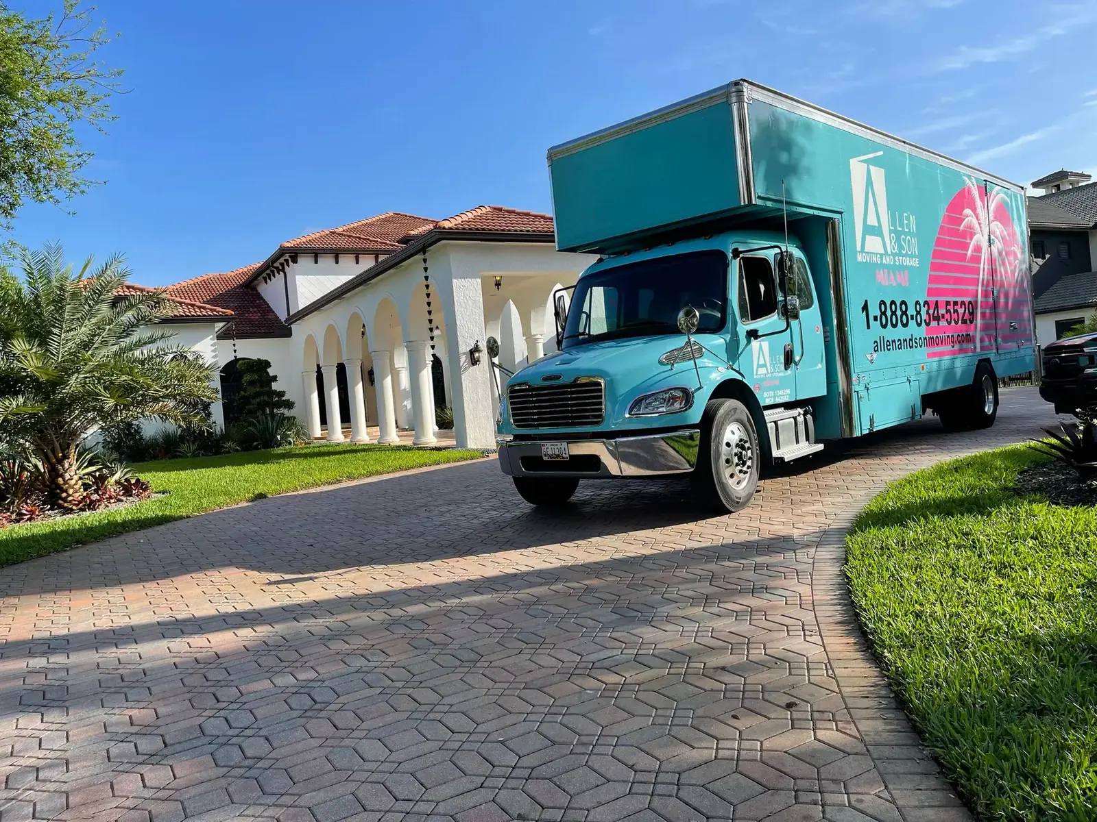 Allen & Son Moving truck in the driveway of a Miami home